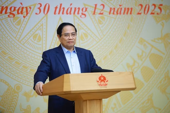Le Premier ministre Pham Minh Chinh s'exprime lors de la conférence nationale, à Hanoi, le 30 décembre. Photo: VNA