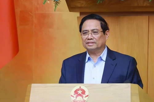 Le Premier ministre Pham Minh Chinh lors de la réunion ordinaire du gouvernement de février. Photo: VNA 