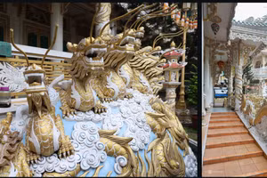 Un temple niché dans une ruelle de Hô Chi Minh-Ville orné de centaines de sculptures de dragons
