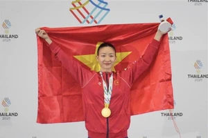 La Vietnamienne Hoàng Thi My Tâm a décroché une médaille d'or dans la catégorie des moins de 61 kg. Photo : VNA/CVN.