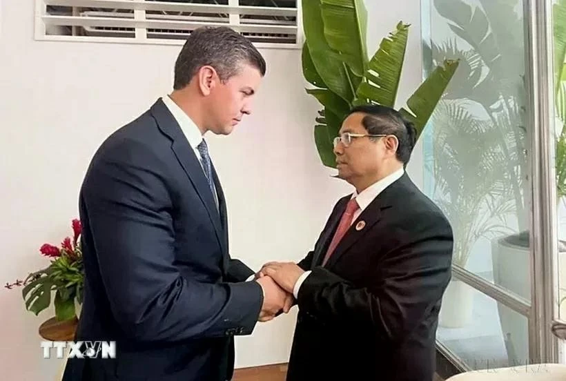 Dans l'après-midi du 19 novembre 2024, lors de sa participation au sommet du G20 à Rio de Janeiro (Brésil), le Premier ministre Pham Minh Chinh a rencontré le président paraguayen Santiago Pena. Photo : VNA.