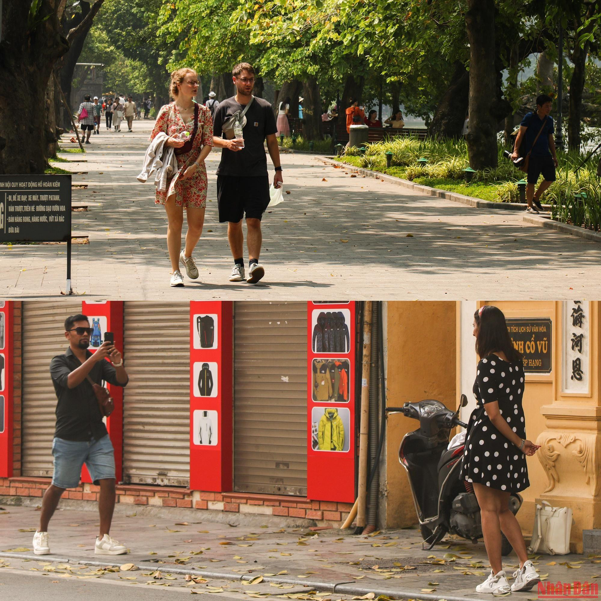 Les touristes étrangers se promènent aussi pour profiter du beau temps de l'automne à Hanoï.