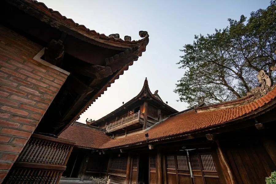 Le temple de la Littérature - Quoc Tu Giam, la première université du Vietnam, est un lieu où ont été formés de nombreux grands personnages, ainsi que celui qui honore les lettrés. Photo : Xinhua. Le temple de la Littérature - Quoc Tu Giam, la première université du Vietnam, est un lieu où ont été formés de nombreux grands personnages, ainsi que celui qui honore les lettrés. Photo : Xinhua.
