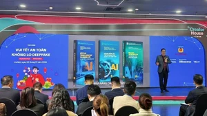 Séminaire « Un Têt en sécurité – sans crainte du Deepfake » à Hanoï. Photo: VNA