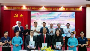 Lors de la cérémonie de signature. Photo / VNA. 