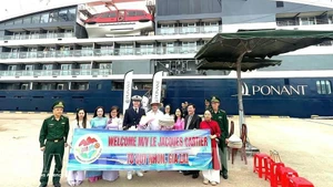 Cérémonie d'accueil des croisiéristes internationaux. Photo : VNA. 