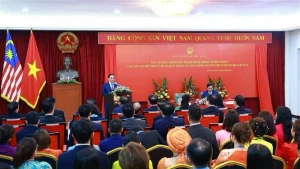 Le Premier ministre Pham Minh Chinh rencontre la communauté vietnamienne en Malaisie. Photo : VNA.