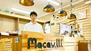 Ngo Ngoc Khanh, propriétaire de la librairie Macaw. Photo : I LOVE VIETNAM.