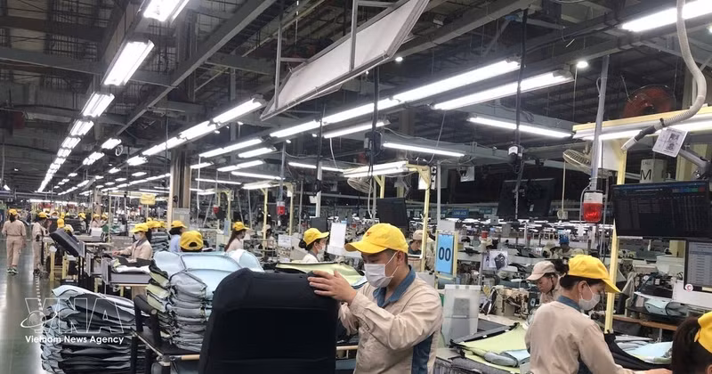 Activités de production de Toyota Boshoku Hanoi. Photo : VNA. 