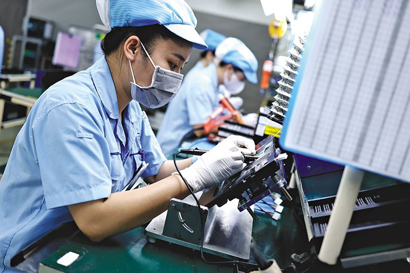Le Vietnam est devenu le « quartier général » de nombreuses multinationales. Photo : Duc Thanh.