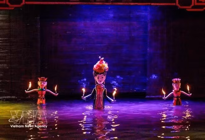 Un numéro de théâtre de marionnettes. Photo : VNA.