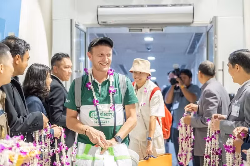 Les touristes étrangers venus au Vietnam. Photo : VNA.