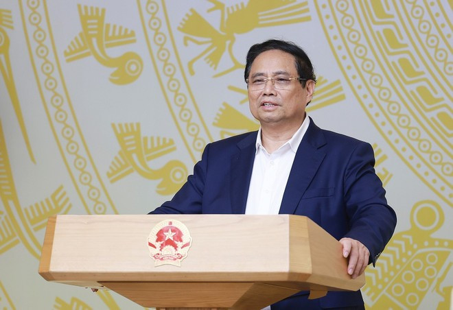 Le Premier ministre s'exprime lors de la conférence. Photo : VNA.