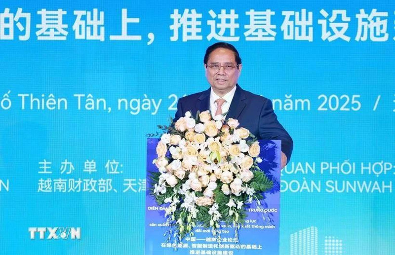 Le Premier ministre Pham Minh Chinh s’exprime lors du Forum de connexion d'affaires Vietnam–Chine à Tianjin. Photo : VNA.