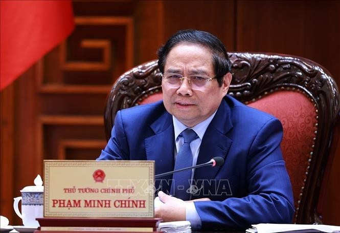 Le Premier ministre Pham Minh Chinh lors de la réunion. Photo : VNA