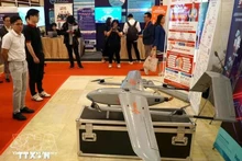 Un espace d'exposition présente des produits technologiques liés à l'IA, l'écosystème de l'IA et les politiques visant à encourager son développement à Da Nang. Photo : VNA 