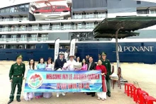 Cérémonie d'accueil des croisiéristes internationaux. Photo : VNA. 