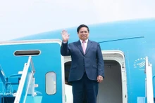 Le Premier ministre Pham Minh Chinh, accompagné d’une délégation vietnamienne de haut rang, a quitté Hanoï, à midi, le 22 mars, pour une visite officielle en Fédération de Russie du 22 au 25 mars. Photo : VNA. 