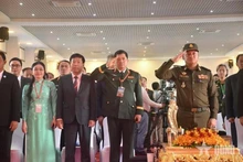 Les délégués vietnamiens lors de la cérémonie. Photo : qdnd.vn 