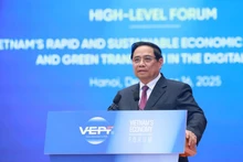 Le Premier ministre Pham Minh Chinh prend la parole lors du Forum économique du Vietnam 2025, perspectives 2026. Photo : VNA. 