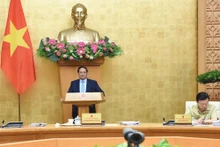 Le Premier ministre Pham Minh Chinh lors de la réunion. Photo : VGP/Nhat Bac.