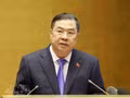 Le vice-Premier ministre permanent Pham Gia Tuc présente un rapport détaillé sur la résolution n° 10-NQ/TW du Bureau politique. Photo : VNA.