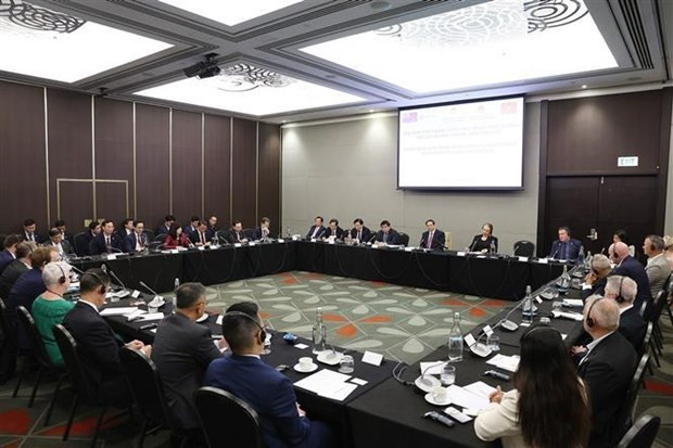 Lor du séminaire entre le Premier ministre Pham Minh Chinh et des entreprises néo-zélandaises à Wellington, le 11 mars. Photo : VNA. Lor du séminaire entre le Premier ministre Pham Minh Chinh et des entreprises néo-zélandaises à Wellington, le 11 mars. Photo : VNA.