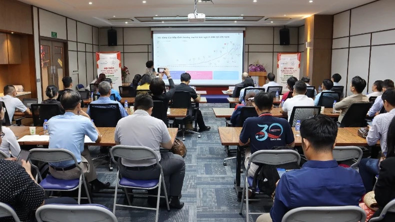 La vue générale du séminaire séminaire intitulé : « Promotion du commerce et de l’investissement sur le marché chilien et sud-américain ». Photo: nhandan.vn