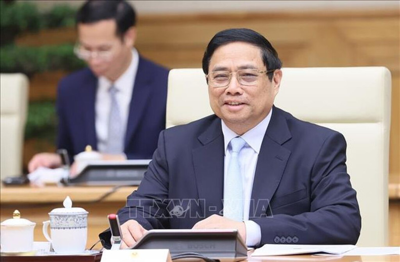 Le Premier ministre vietnamien, Pham Minh Chinh, lors de son entretien avec son homologue lao Sonexay Siphandone. Photo : VNA.