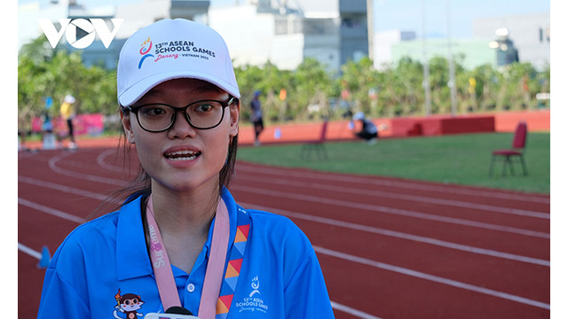 Nguyên Pham Tra My, bénévole de la délégation sportive malaisienne. Photo : VOV.