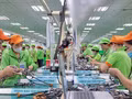 Chaîne d’assemblage des produits après transformation dans l’usine de Bandai Vietnam. Photo : VNA.
