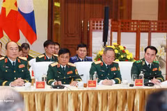 Rencontre des ministres de la Défense du Vietnam, du Laos et du Cambodge à Hanoï. Photo : VNA.