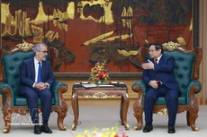 Le Premier ministre Pham Minh Chinh (à droite) et le ministre d’État et ministre des Affaires étrangères du Portugal, Paulo Rangel. Photo : VNA.