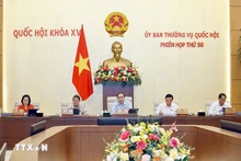 Le président de l’Assemblée nationale Tran Thanh Man (centre) s’exprime lors des débats sur le projet de loi sur la presse (amendée), à Hanoi, le 8 octobre. Photo : VNA.