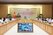 Le Premier ministre Pham Minh Chinh prend la parole lors de la réunion. Photo : VNA.