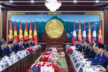 Lors de l'entretien entre les deux dirigeants du Vietnam et du Laos. Photo : VNA.