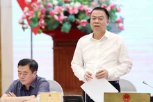 Le vice-ministre des Finances, Nguyen Duc Chi, s'exprime lors de la conférence de presse. Photo : VNA.