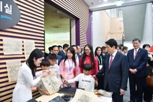 Le président Luong Cuong à la rencontre des Vietnamiens d'outre-mer en République de Corée. Photo : NDEL.