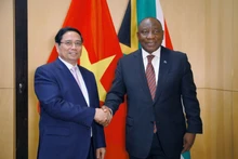 Le Premier ministre Pham Minh Chinh (à gauche) et le président sud-africain, Cyril Ramaphosa. Photo : VGP.