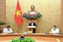 Le Premier ministre Pham Minh Chinh s'exprime lors de la réunion.