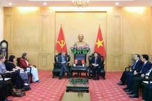 Le professeur-docteur Nguyen Xuan Thang, directeur de l’Académie nationale de politique Ho Chi Minh, reçoit l’ambassadeur du Danemark au Vietnam, Nicolai Prytz. Photo : VNA.