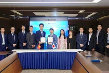 La cérémonie de signature de l’accord de partenariat stratégique global entre FPT et ANA Systems, organisée dans le cadre de la conférence mondiale annuelle du groupe à Da Nang.