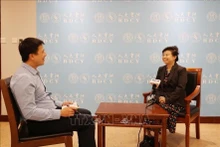 Liu Ying, chercheuse à l'Institut d'études financières de Chongyang, relevant de l'Université Renmin de Chine accorde une interview au correspondant de l'Agence vietnamienne d'Information. Photo : VNA.