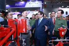 Le Premier ministre Pham Minh Chinh lors du salon professionnel de la sécurité Secutech+ Vietnam, à Ho Chi Minh-Ville, le 14 août. Photo : VNA.