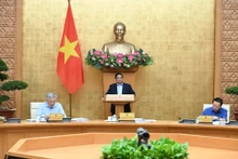 Le Premier ministre Pham Minh Chinh lors de la réunion périodique d'août du gouvernement, le 6 septembre. Photo : NDEL. 