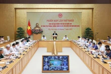 Première réunion du Comité directeur national pour la défense civile, le 24 juillet à Hanoi. Photo : VNA.