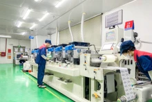 Face à la pression des normes écologiques mondiales, de nombreuses entreprises vietnamiennes du secteur de l’emballage doivent se réinventer. Photo : printvietnam.