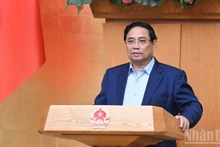 Le Premier ministre Pham Minh Chinh a appelé à des efforts concertés pour atteindre tous les objectifs fixés pour 2025. Photo : NDEL.