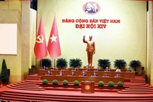 Lors du XIVe Congrès national du PCV. Photo : VNA.