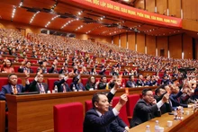 La deuxième journée de travail du XIVe Congrès national du Parti. Photo : NDEL.